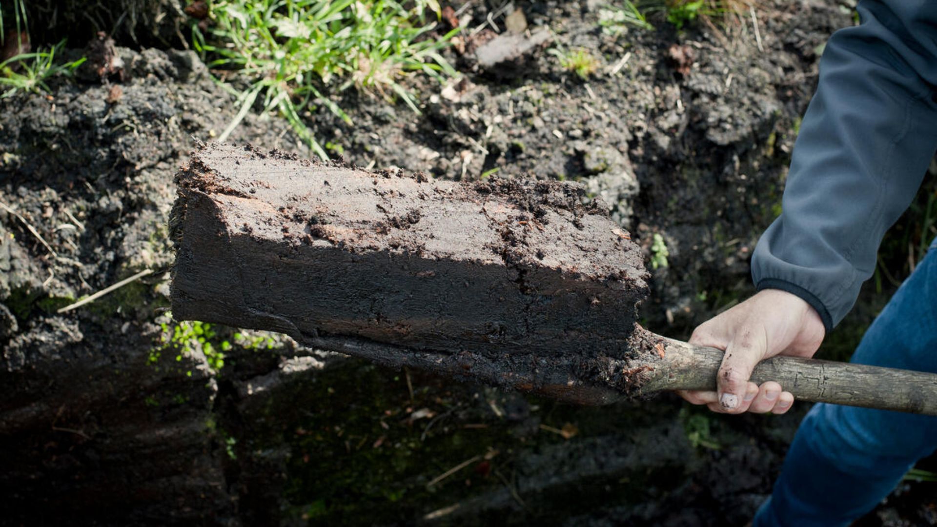 Traditional turf cutting in an Irish bog