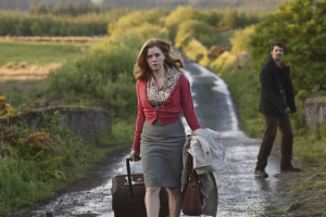 Woman walking along a rural road in Connemara during a scene from the film Leap Year